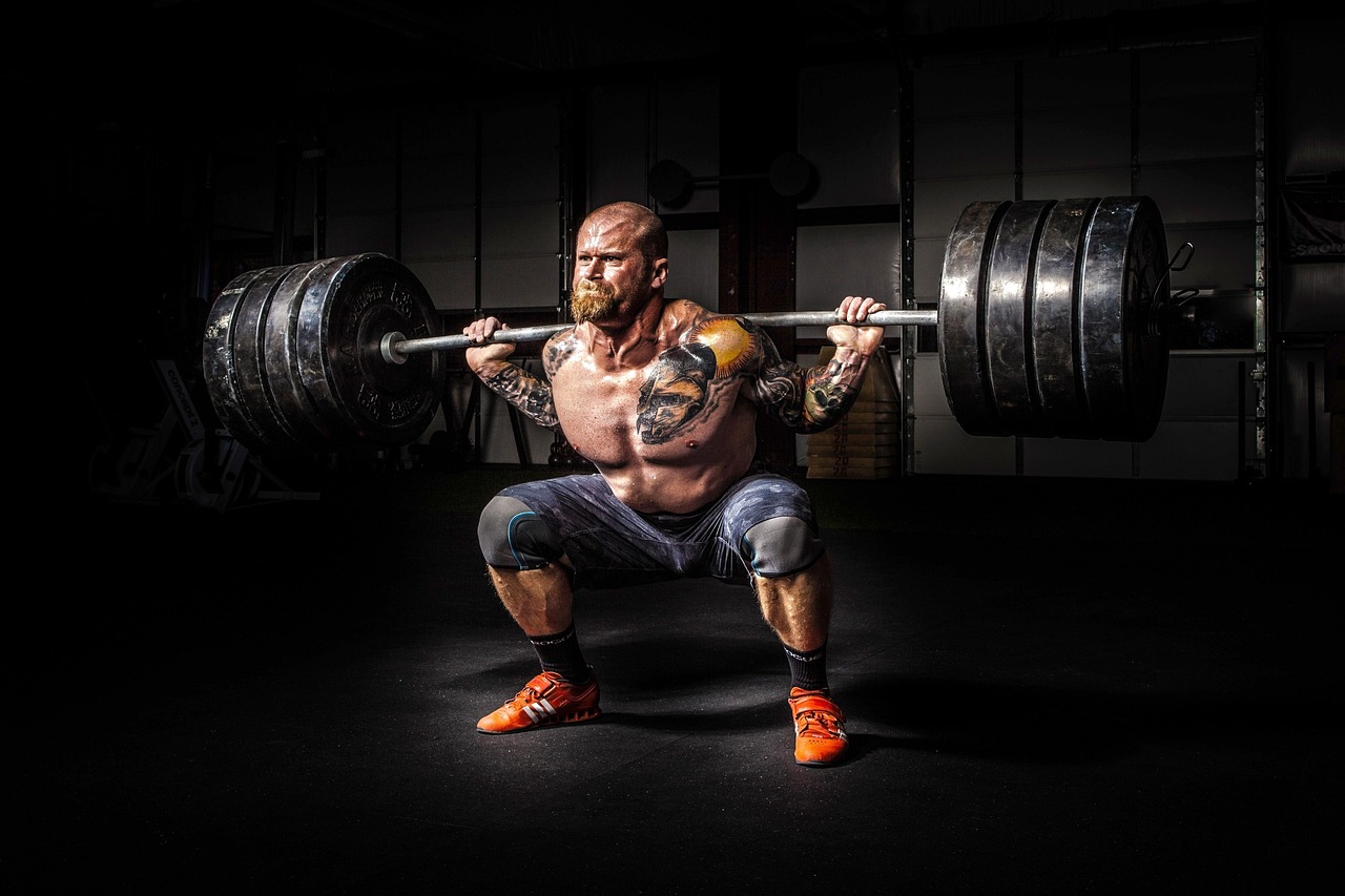 Man performing heavy squats
